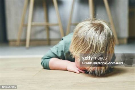 Boy Crying Floor Photos and Premium High Res Pictures - Getty Images