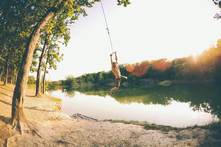 Rope swing lake Images - Search Images on Everypixel