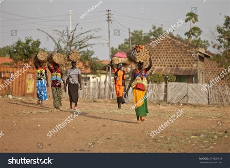 Torit, South Sudan-February 20 2013: Unidentified Women Carry Heavy ...