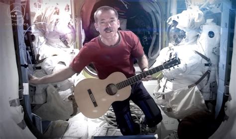 ESA - Chris Hadfield plays guitar on the Space Station