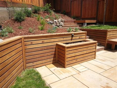 wood retaining wall weep holes #retainingwallideas | Sloped backyard ...