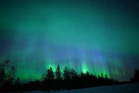 Northern Lights Hunting Photography In Rovaniemi Finland