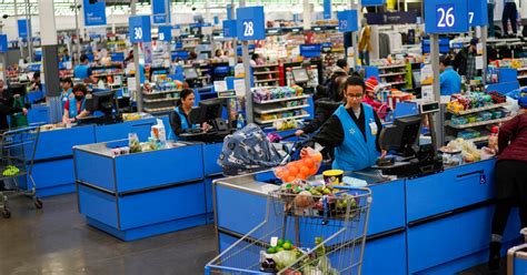 Walmart Raises Its Outlook as Shoppers Look for Bargains - The New York Times