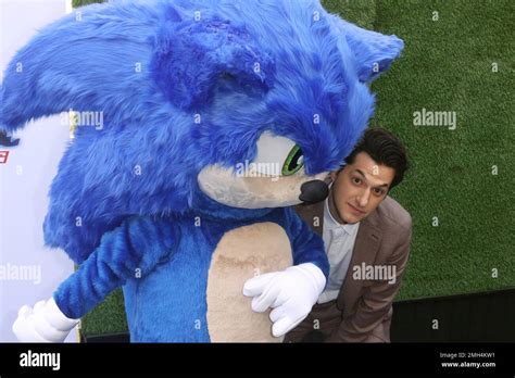 Sonic, left, and actor Ben Schwartz arrive at the LA Premiere of "Sonic The Hedgehog" at the ...