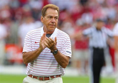 Which team did Nick Saban coach in the NFL?