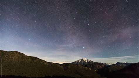 "Timelapse Milky Way Mountains" by Stocksy Contributor "Carl Zoch ...