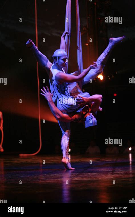 Acrobats from Cirque du Soleil perform "QUIDAM" in Shanghai Stock Photo - Alamy