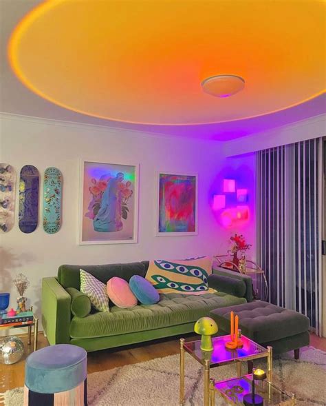 a living room filled with furniture and colorful lights