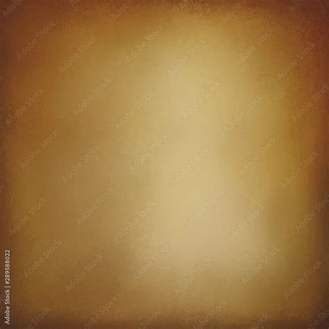 old golden brown background with vintage texture and dark vignette ...