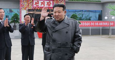 Kim Jong-un dons trench coat to vote in North Korean 'elections ...