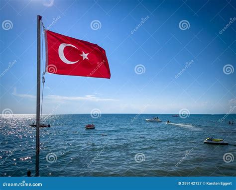 On the Beach in Turkey Flies the Red Flag of Turkey Stock Image - Image ...