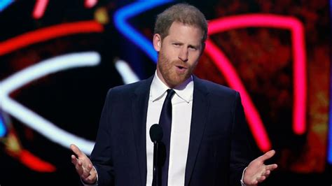 Prince Harry jokes at NFL Honors after visiting father