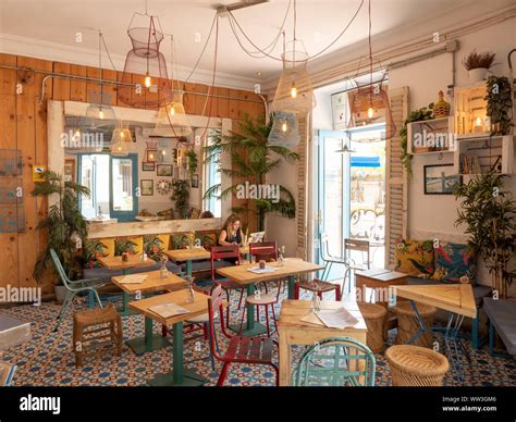 Interior of small independent cafe in the Malasana district, Madrid, Spain Stock Photo - Alamy