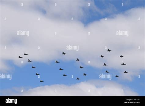 London, UK. 10th July, 2018. Fighter Jets spell out 100 in RAF ...