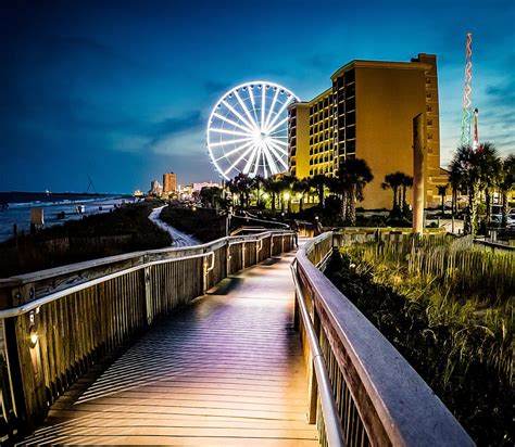 Myrtle Beach Boardwalk At Night Photograph by David Smith