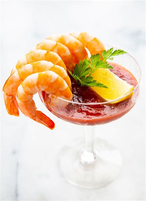 Cooked, cold shrimp served in a coupe or martini glass with homemade ...