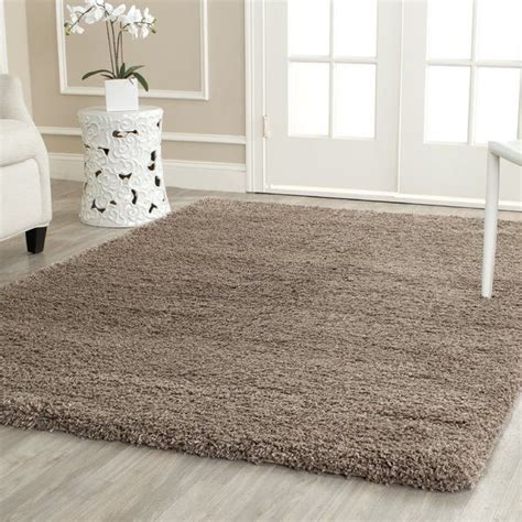 Hand-tufted shag rug in taupe. | Shag area rug, Taupe rug, Cozy shag rug