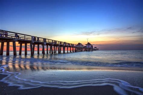 Naples Pier on the Beach at Sunset Stock Photo - Image of gulf, high ...