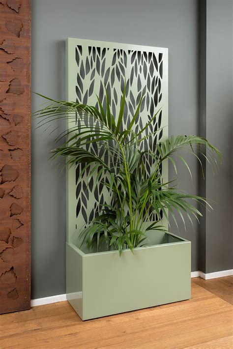 A freestanding screen offering privacy and a generous planter for your greenery