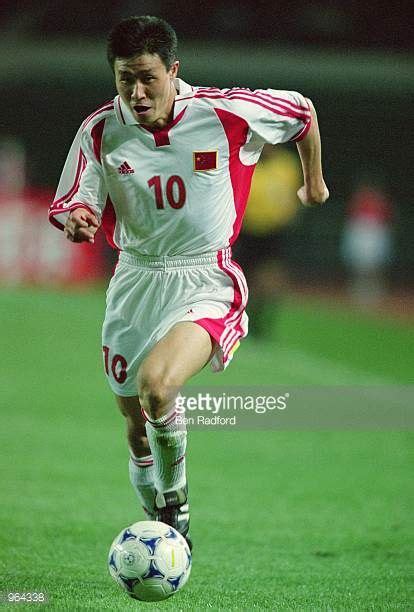 Hao Haidong of China runs with the ball during the FIFA 2002 World Cup ...