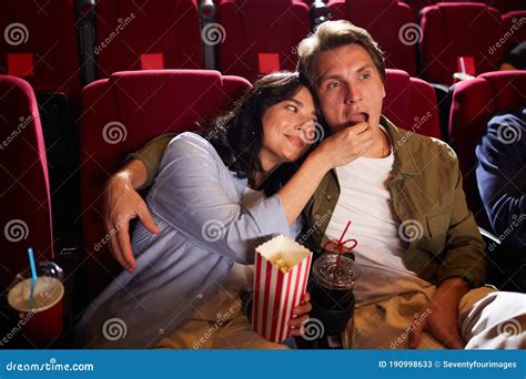 Couple Enjoying Date in Cinema Stock Image - Image of arts, eating: 190998633