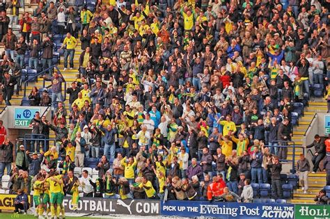 Norwich City away fans celebrate a goal in the Bill Shankl… | Flickr