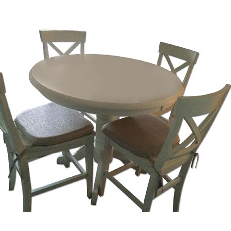 Ikea Wood Round Dining Table w/ 4 Chairs - AptDeco