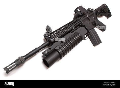 US Army M4A1 tactical carbine with M203 grenade louncher. Isolated on a ...