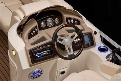 Bennington Pontoon's 2275 GCW Sport Arch console with ivory, espresso and teak accents ...