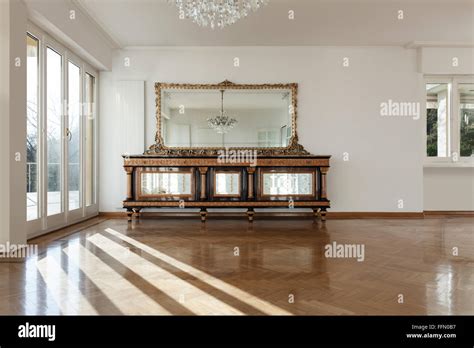 interior of an house, empty room with a period cabinet, parquet floor ...