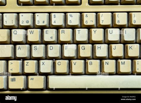 Old keyboard of a computer cloes up, with letters and numbers Stock Photo - Alamy