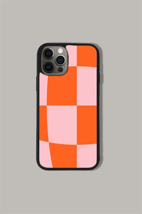 an orange and pink iphone case on a gray background