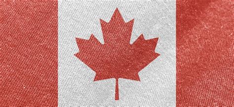 Premium Photo | Canada flag fabric cotton material wide flag wallpaper