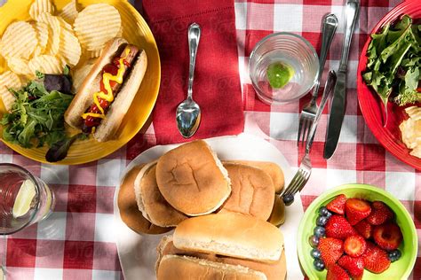 "Picnic Table Setting American Food" by Stocksy Contributor "Neil Kremer" - Stocksy