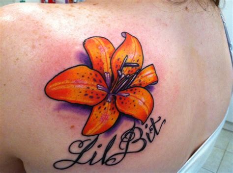 My new tattoo!! (Nickname,tiger lily) major color I love it(; | Tattoos, New tattoos, Body art