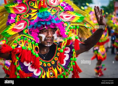 Kalibo, Aklan, Western Visayas, Philippines. A participant in the Ati-atihan festival wearing ...