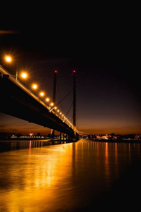 Free Images : sky, night, cable stayed bridge, reflection, water, landmark, light, architecture ...