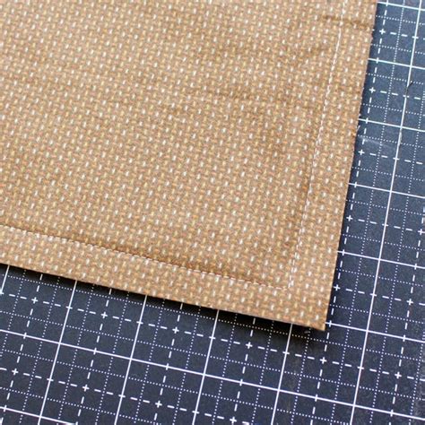 To finish, use a half-inch seam allowance and top stitch around all of the edges, finger ...