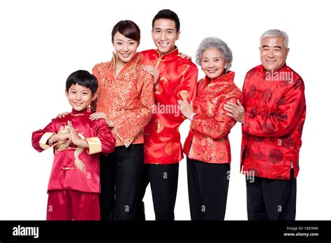 Family Dressed in Traditional Clothing Celebrating Chinese New Year ...