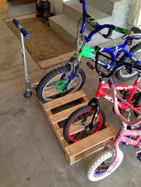 Build a bike rack from recycled pallets | Bike storage garage, Kids bike storage, Diy bike rack