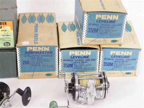 Collection of Nine Vintage Penn Fishing Reels and Assorted Parts ...