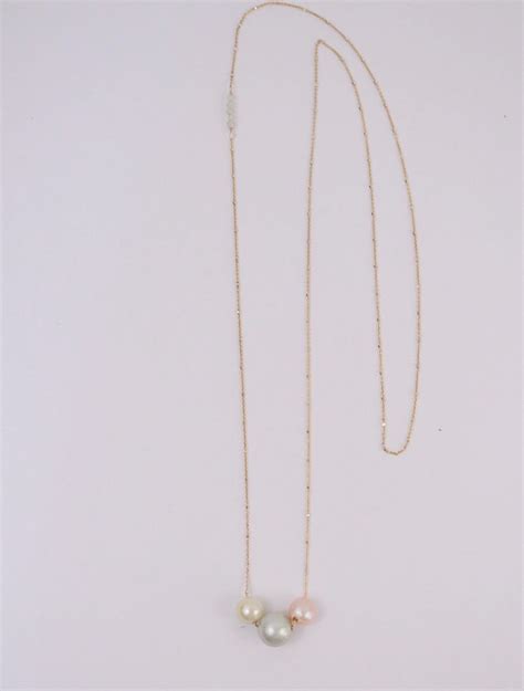 Rainbow Floating Pearl Necklace | Floating pearl necklace, Pearl necklace, Necklace
