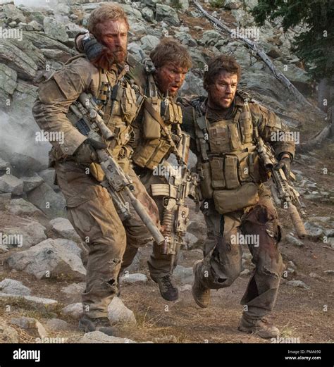 (L to R) Matt "Axe" Axelson (BEN FOSTER), Danny Dietz (EMILE HIRSCH ...