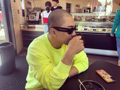 Big Bang's Taeyang rocks a buzz cut, sunglasses, and neon in recent ...