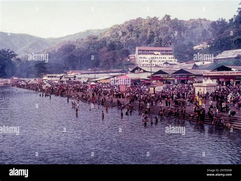 Pilgrims bathing in Pamba river near Sabarimala, Kerala, South India ...