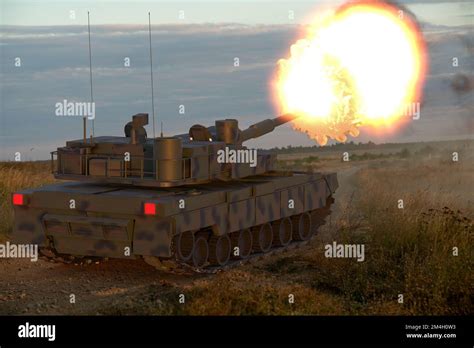 Basic tank firing a cannon Stock Photo - Alamy