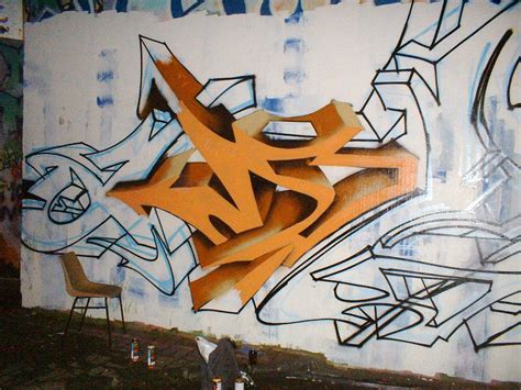 Create 3D Graffiti with the Motives and Character of Yellow - White Wildstyle on a Wall of Natural