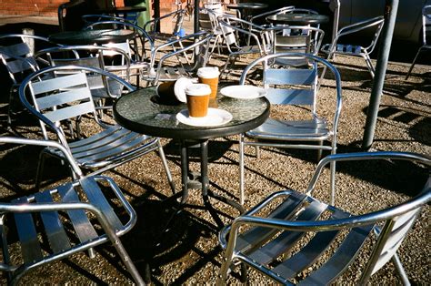 Disposable coffee cups, table and chairs | Photographed usin… | Flickr