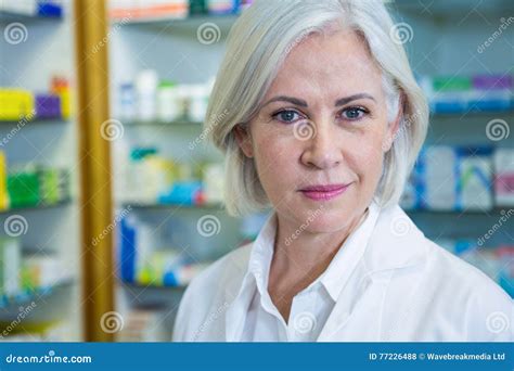 Pharmacist in lab coat stock photo. Image of pharmaceutical - 77226488