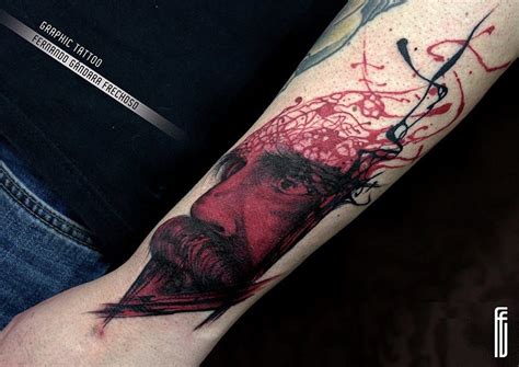 a man's arm with a red and black portrait tattoo on the left forearm